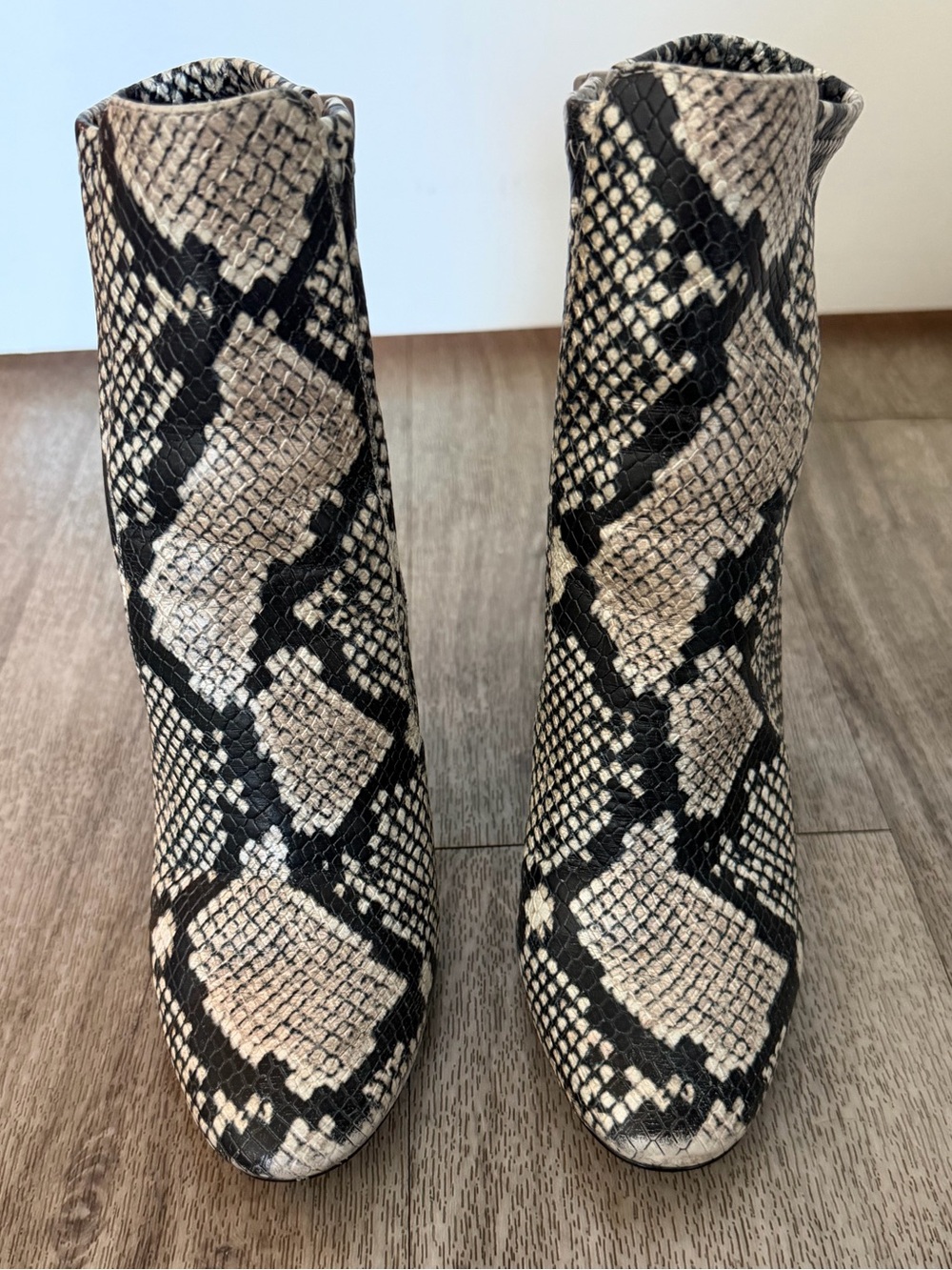 Aldo Snake-Print Ankle Boots in Black and Cream